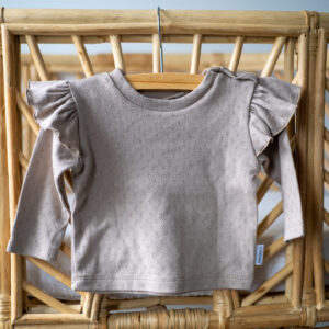 Shirtje met knoopjes op de schouder